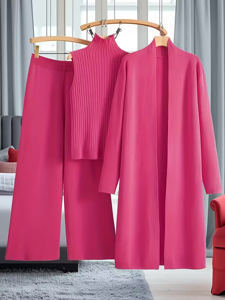 Woman in a matching three-piece knit set