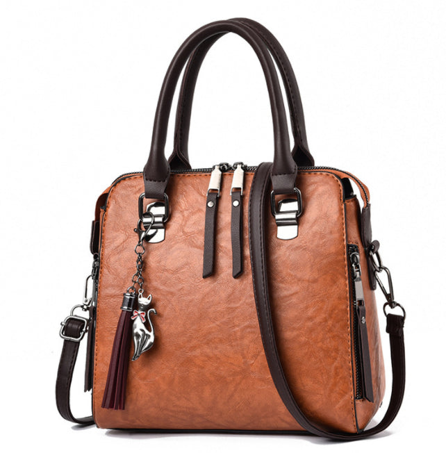 Vintage faux leather purse with tassel