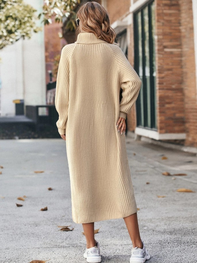Woman in a long turtleneck sweater dress