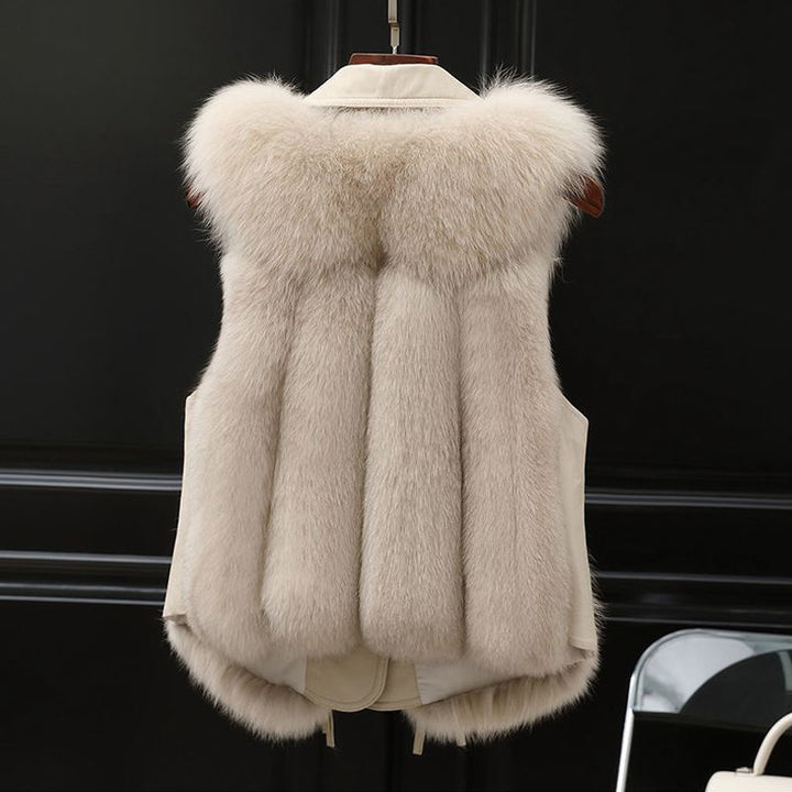 Woman in a short faux fur vest