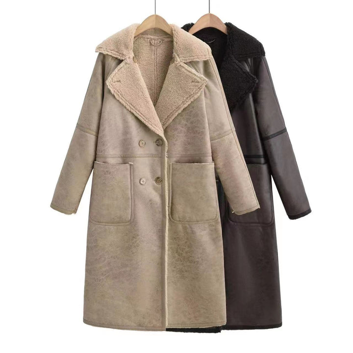 Woman in a belted faux shearling coat