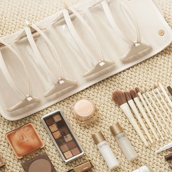 Cream toiletry bag with clear pouches