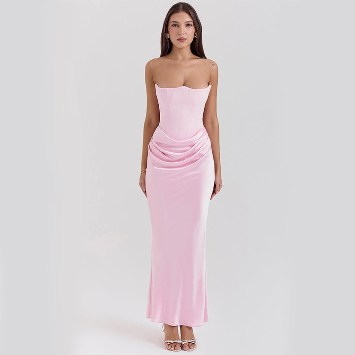 Woman in a strapless satin maxi gown