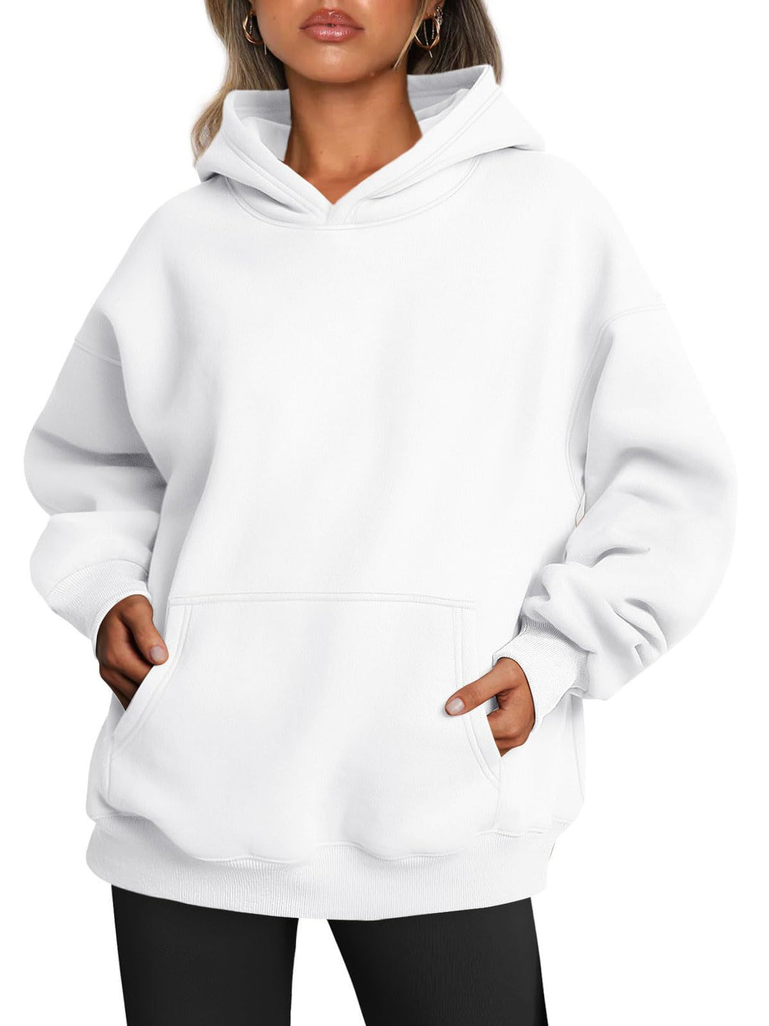 Woman wearing oversized fleece hoodie