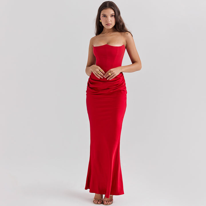 Woman in a strapless satin maxi gown