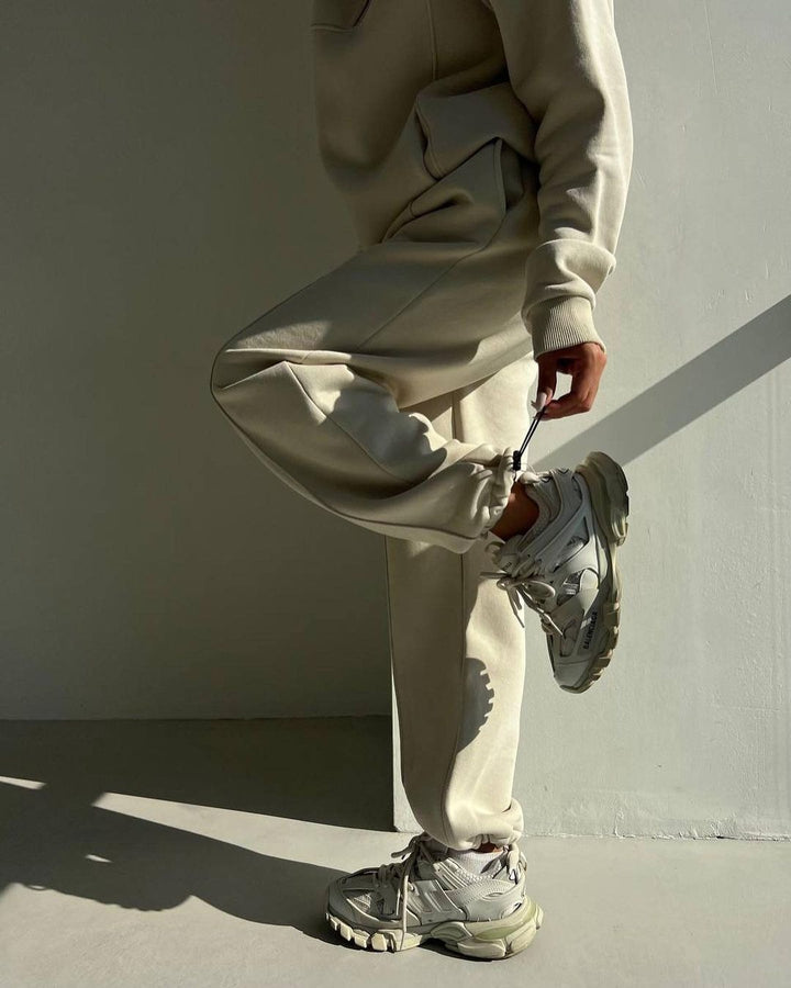 Woman in a half-zip fleece tracksuit