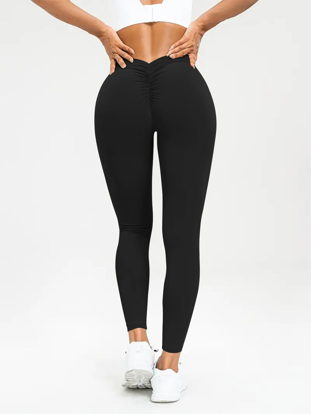 Woman in high-waisted scrunch leggings