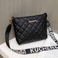 Black quilted crossbody bag with wide strap