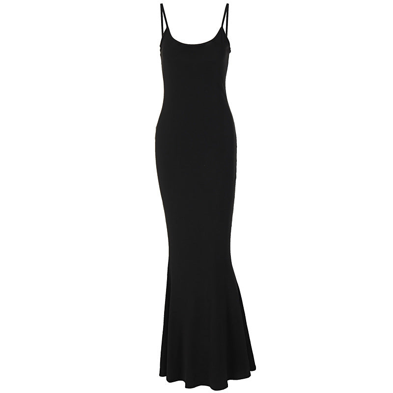 Woman in bodycon maxi dress with mermaid hem