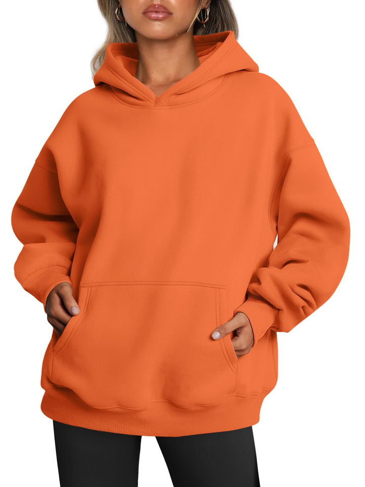 Woman wearing oversized fleece hoodie