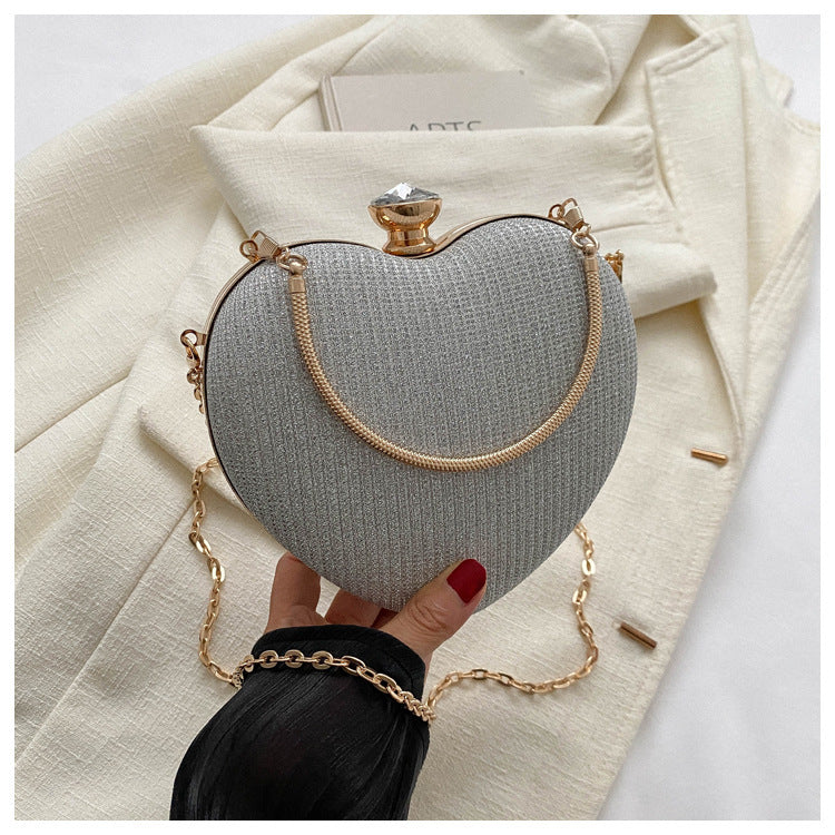 Heart-shaped metallic clutch with chain