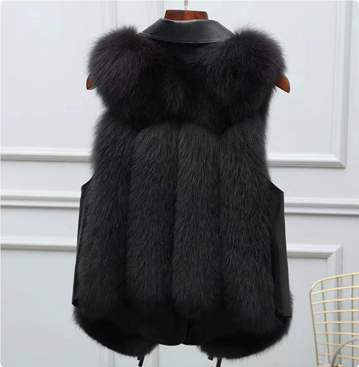 Woman in a short faux fur vest