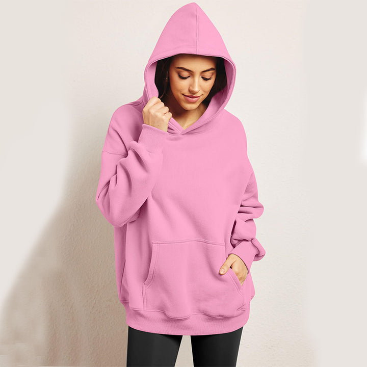 Woman wearing oversized fleece hoodie