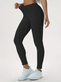 Woman in high-waisted scrunch leggings