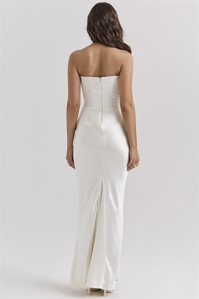 Woman in a strapless satin maxi gown