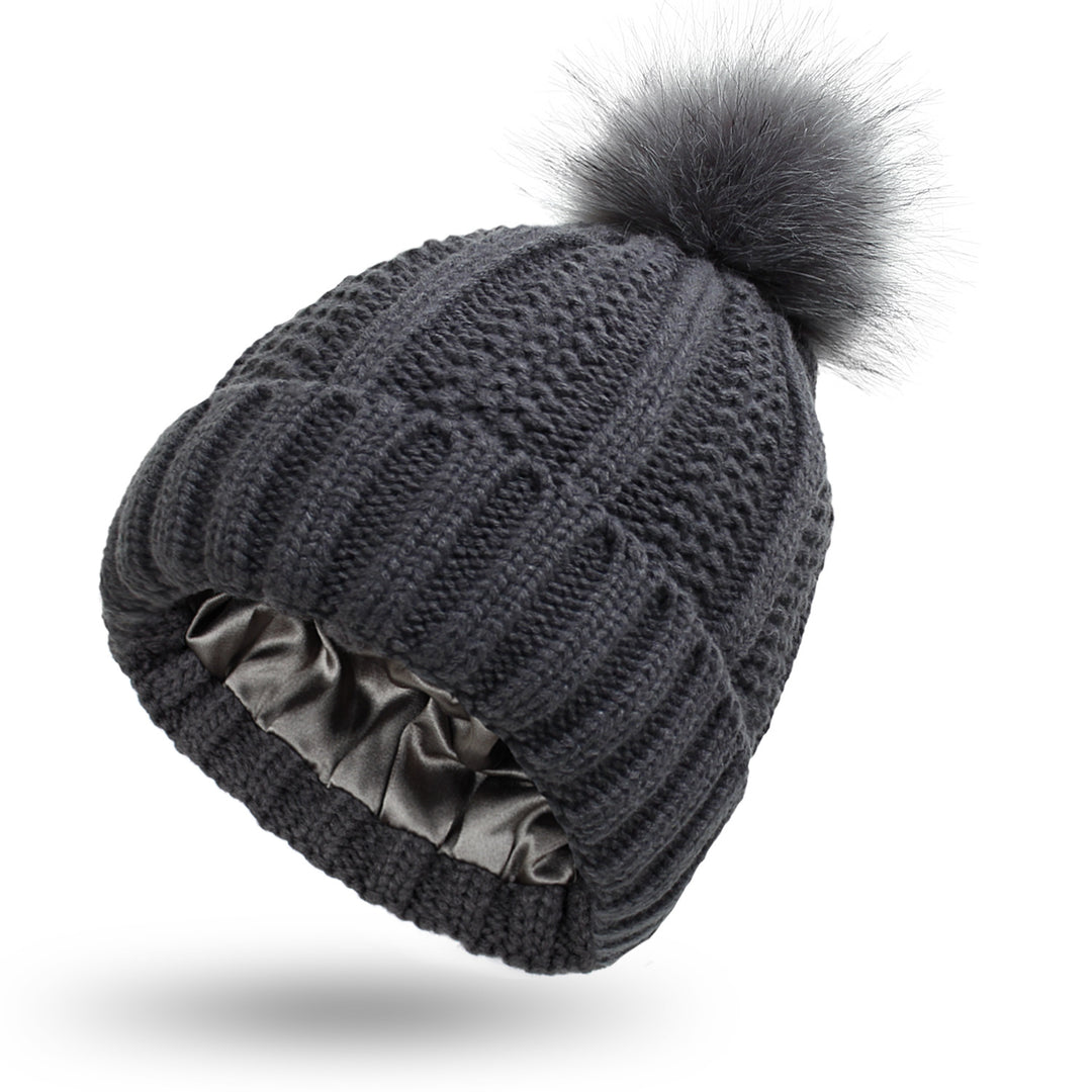 Knit beanie with faux fur pom pom
