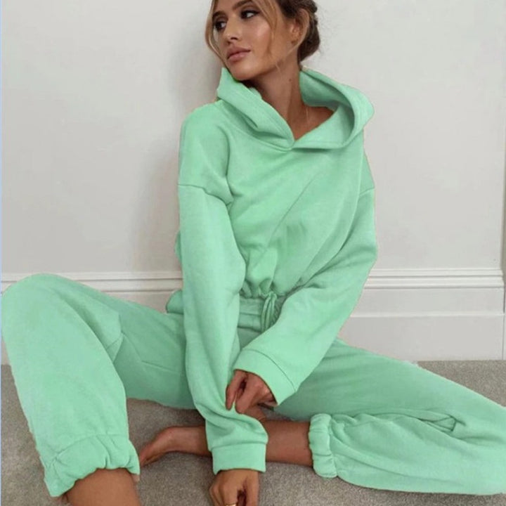Woman in cropped hoodie and jogger set