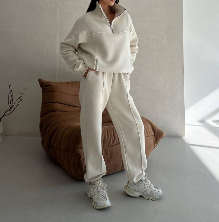 Woman in a half-zip fleece tracksuit