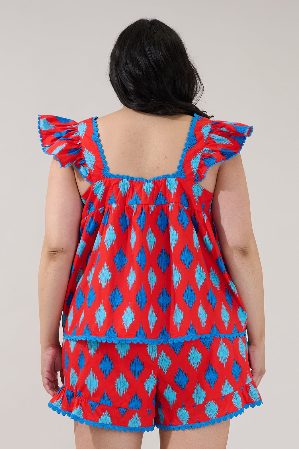 Ada Ruffle Top Abstract Curve