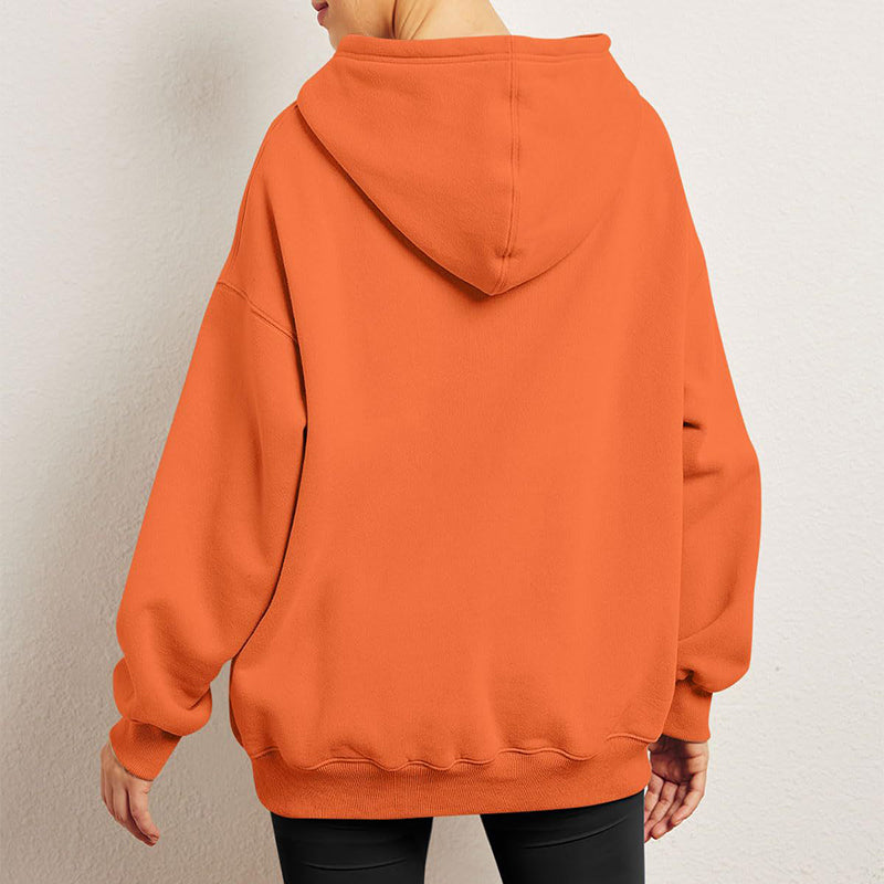 Woman wearing oversized fleece hoodie