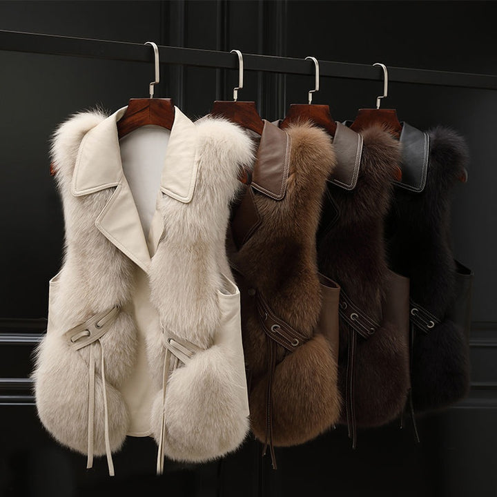 Woman in a short faux fur vest