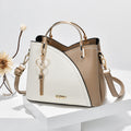 Color block handbag with heart tassel
