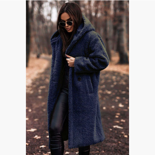 Woman in long hooded teddy coat