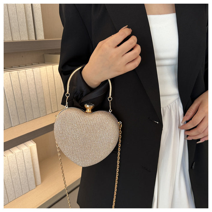 Heart-shaped metallic clutch with chain