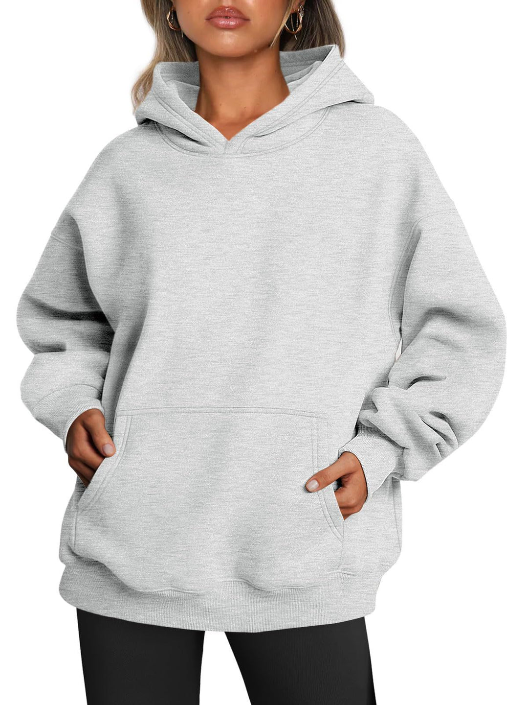 Woman wearing oversized fleece hoodie