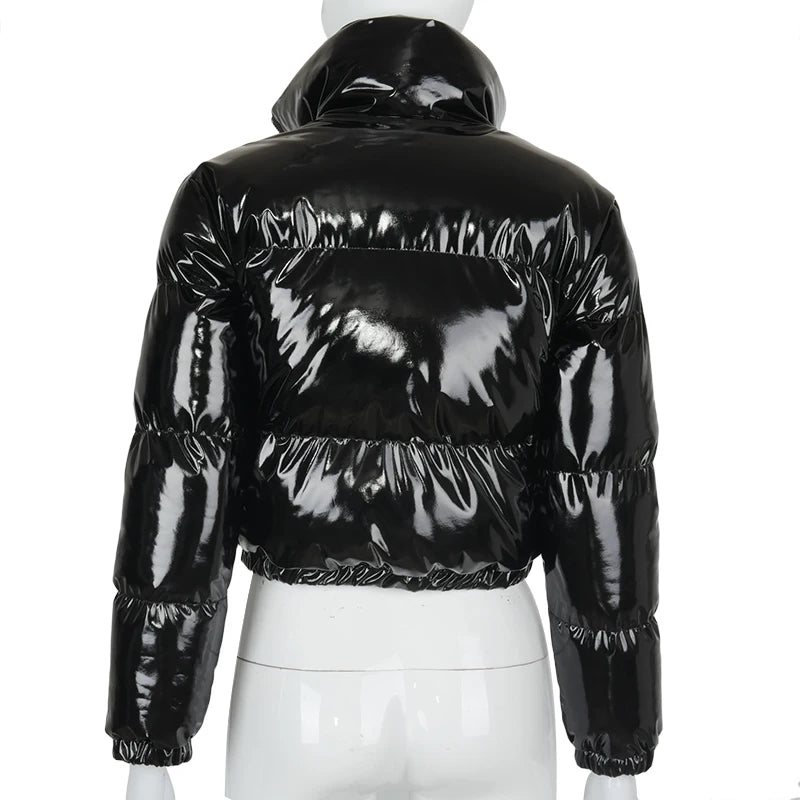 Woman in a glossy cropped puffer jacket