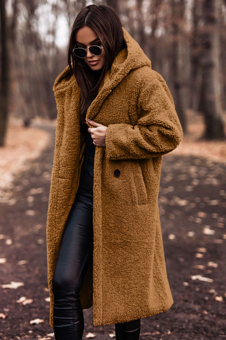 Woman in long hooded teddy coat