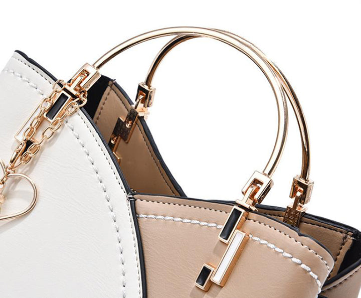 Color block handbag with heart tassel